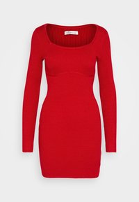 Abito a maglione rosso a coste con maniche lunghe, scollatura quadrata e silhouette aderente. Tessuto texturizzato con una finitura liscia.