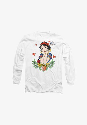 White long-sleeve shirt with a graphic of a cartoon character surrounded by hearts, flowers, and a bird, featuring vibrant colors and a playful design.