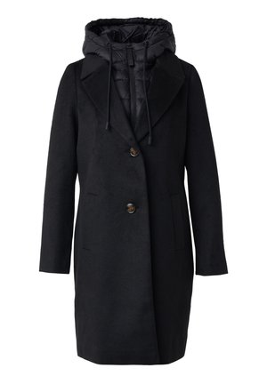 Cappotto di lana nero con cappuccio imbottito rimovibile, caratterizzato da un design doppiopetto, due tasche frontali e una superficie liscia.