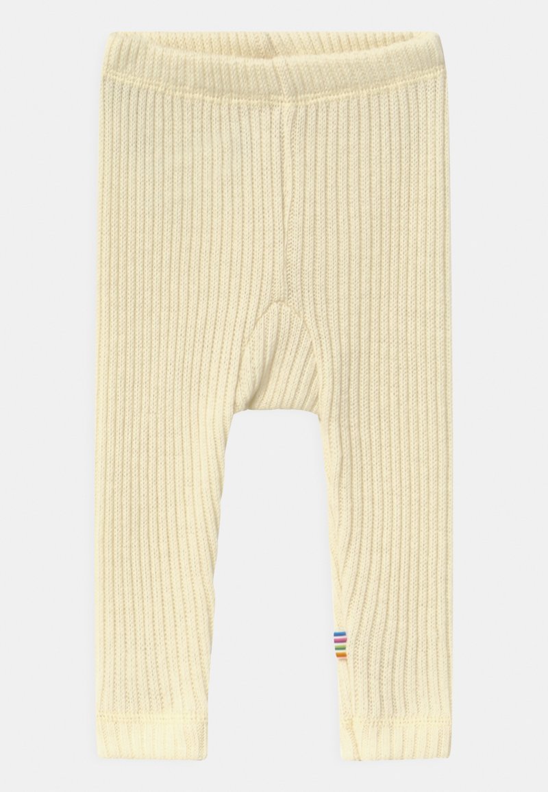 Leggings jaunes à côtes avec une finition texturée et une taille élastique. Présente un accent rayé multicolore au bas.