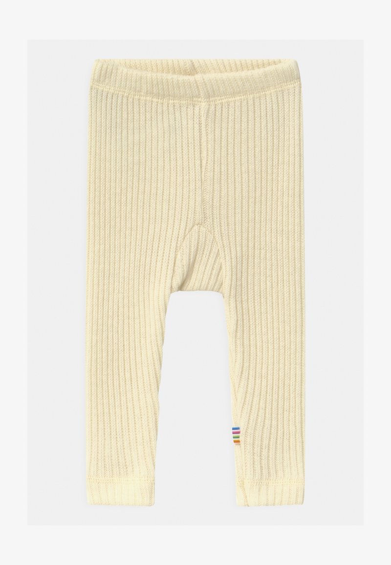 Leggings amarelas com textura e cintura elástica. Apresenta um detalhe listrado multicolorido na bainha.