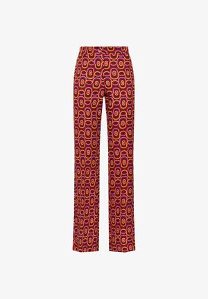 Patterned trousers featuring geometric shapes in red, orange, pink, and brown tones; made of lightweight fabric with a straight-leg design.