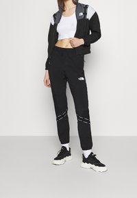 The North Face Träningsbyxor - black