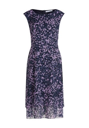 Seidenmischungskleid in Marineblau mit lilafarbenen Punktmustern, mit kurzen Ärmeln und lockerer Passform. Es hat einen zarten Saum mit einem transparenten Overlay.