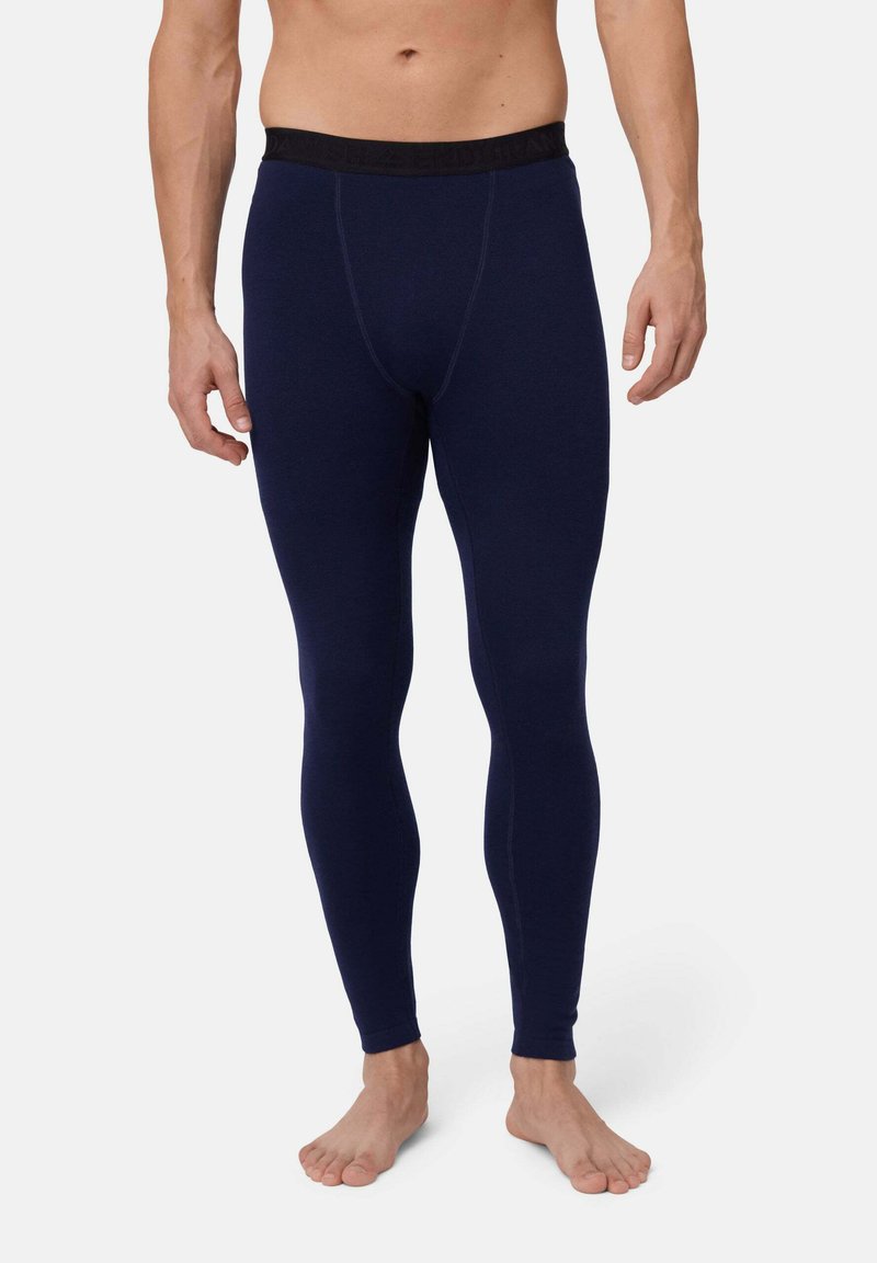 Marineblaue Thermoleggings mit enger Passform, aus einem weichen Material. Mit einem schwarzen elastischen Bund mit Markentext.