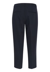 Pantalons ajustés bleu marine avec une taille plate et deux poches arrière. Fabriqués dans un tissu lisse avec une coupe droite et des poignets ourlés.