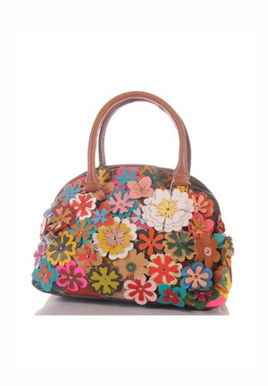 Brown leather handbag decorated with colorful layered flower appliques in various shapes and sizes covering the surface.
