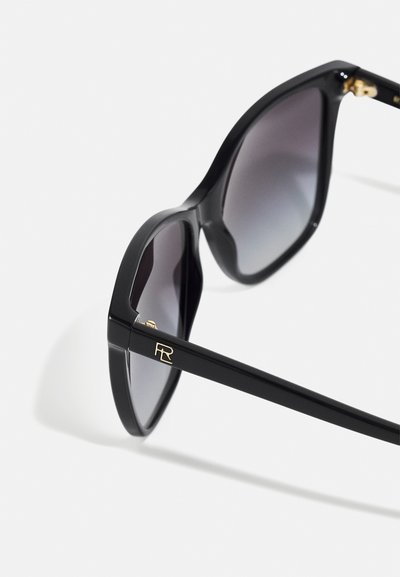 Black rectangular sunglasses with dark gradient lenses. Features gold hardware and a logo on the temple. Glossy plastic frame with smooth texture.
