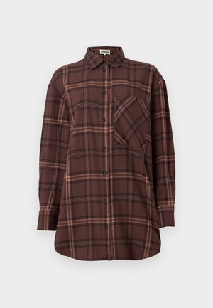 Brown plaid shirt with long sleeves, button-down front, single chest pocket, and a soft fabric texture. Features darker and lighter tones.
