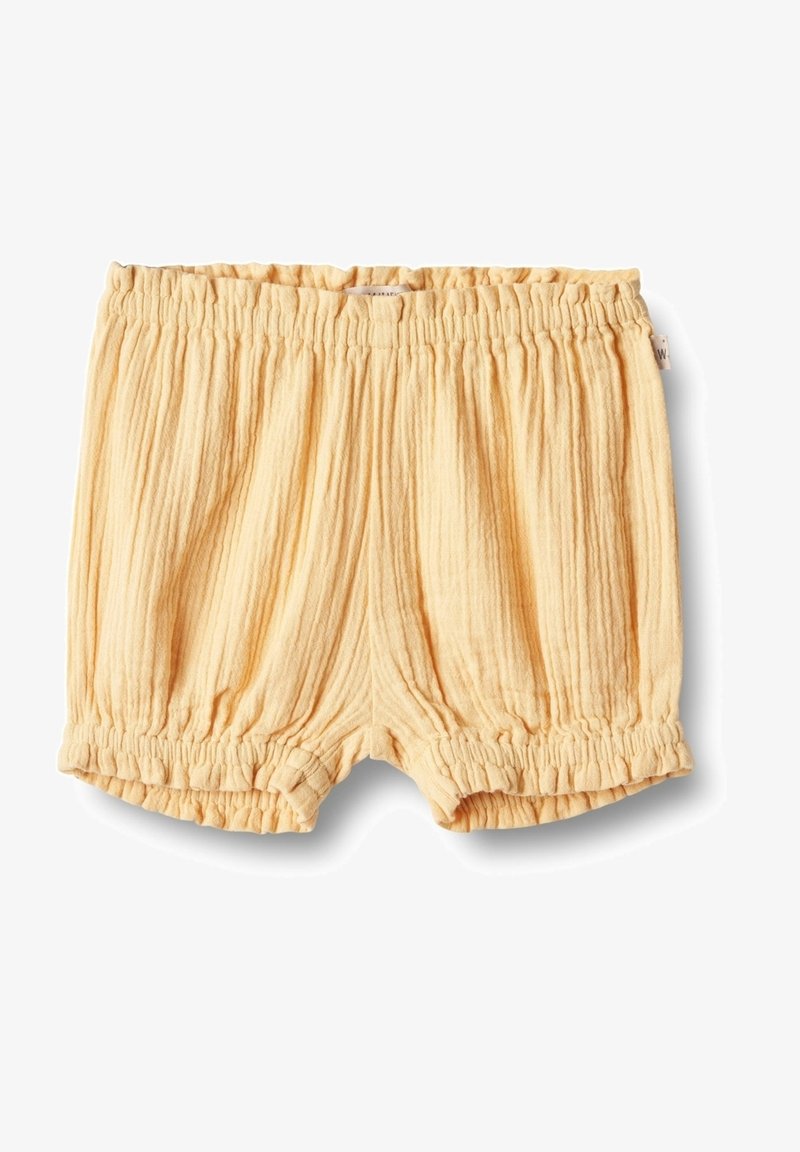 Shorts texturés orange clair avec taille élastique et ouvertures aux jambes, conçus pour le confort et l'élasticité.