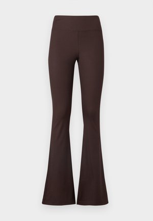 Brown flared leggings made from a stretchy, ribbed fabric with a high waistband and an understated design. Smooth texture throughout.