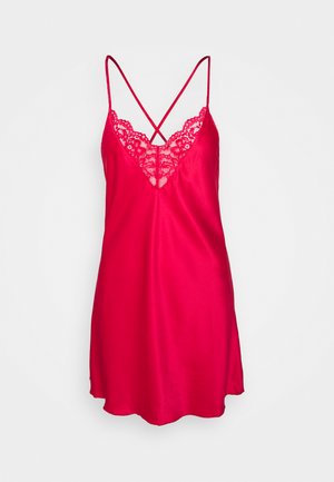 Red satin slip dress with lace trim and adjustable crisscross straps. Features a V-neckline and smooth texture.