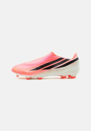 adidas Performance, F50 HYPERFAST LEAGUE LACELESS FIRM GROUND UNISEX - Chaussures de football pour terrain sec - solar turbo/core black/gold-coloured metallic