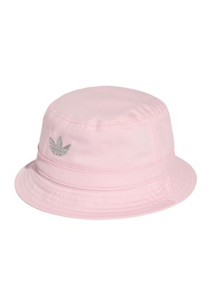 Light pink fabric bucket hat with a small gray embroidered Adidas trefoil logo on the side and stitched brim detailing.