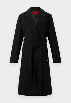 Black long wool coat with belt tie, notched lapels, side pockets, and red inner label reading "HUGO."