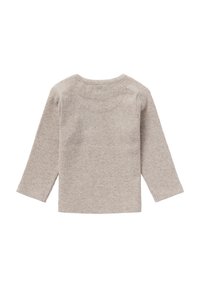 Beige geripptes Langarmoberteil mit Rundhals, das seitliche Schlitze am Saum aufweist. Weicher, strukturiertes Material mit einer figurschmeichelnden Silhouette.