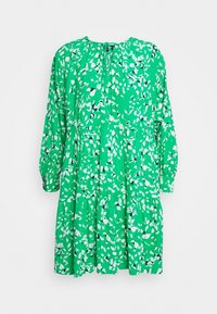 Vestido verde con patrón de hojas blancas, mangas largas, escote redondo y cintura fruncida. Hecho de una tela ligera, cuenta con un cierre de botón en la parte posterior.