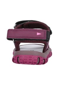 Lila sandaler med justerbara remmar, vadderad fotbädd och texturerad gummisula med cirkulära mönster för bra grepp.