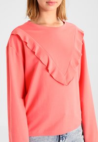 Urban Classics LADIES TERRY VOLANT CREW - Melegítőfelső - coral