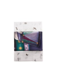 Wrapped gift with patterned tissue paper featuring silver accents. The contents are partially visible, displaying colorful graphics and various shapes.