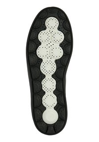 Černobílá podrážka boty se strukturovaným designem s kulatými prohlubněmi, kruhovými vzory a drenážními otvory pro prodyšnost.