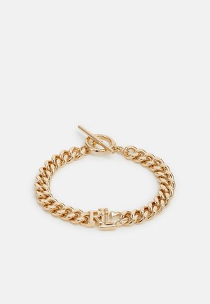 Bracelet chaîne ton or avec maillons entrelacés, fermoir bascule, et détail du logo "RL" sur fond blanc.