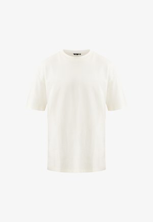 Witte katoenen t-shirt met korte mouwen, ronde halslijn en een relaxte pasvorm. Glad textuur, geen patronen, minimalistisch ontwerp.