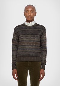 Knit sweater with a round neck, featuring a textured pattern in dark hues with blue and orange accents. Ribbed cuffs and hem.
