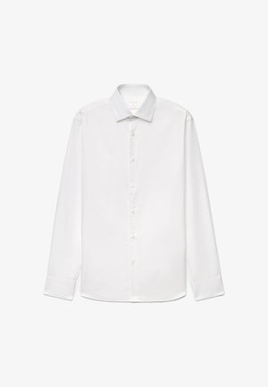Chemise blanche à manches longues avec col pointu et fermeture boutonnée sur le devant, présentée à plat sur fond blanc.