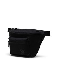 Marsupio nero in tessuto con forma arrotondata, tasca frontale con zip e patch con logo. Cinghia regolabile per indossarlo in vita.