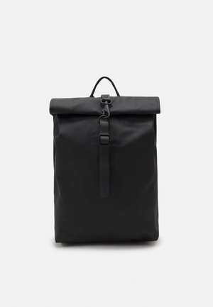 Black roll-top backpack made of smooth fabric, featuring a buckle closure, top handle, and minimalist design with no visible patterns.