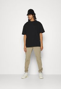 Kings Will Dream WYATT - Calças cargo - stone