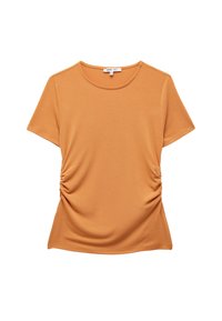 Kortærmet sennep-orange t-shirt med rund hals og detaljeringspunkter i siden, lavet af blødt, let stof. Glat overflade hele vejen igennem.