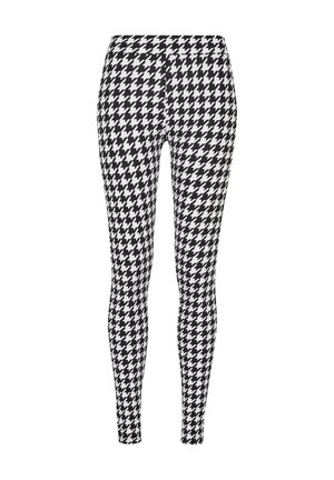 Black and white houndstooth patterned leggings, fitted design, stretchy material, smooth texture, and tapered legs.