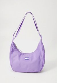 Purple nylon shoulder bag with a rounded shape, zipper closure, and a small rectangular logo patch. Smooth texture and adjustable strap.