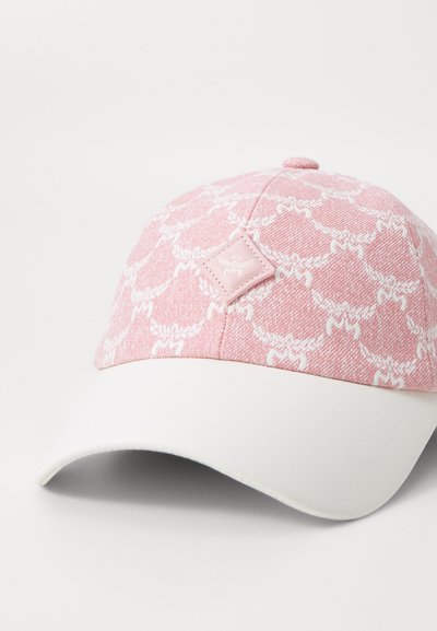 Pink cap with white patterned fabric featuring a textured design; white visor and a small logo patch on the front.