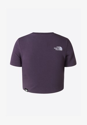 T-shirt violet cropped en coton, avec manches courtes, encolure ronde, et logo brodé blanc dans le dos, près du cou.