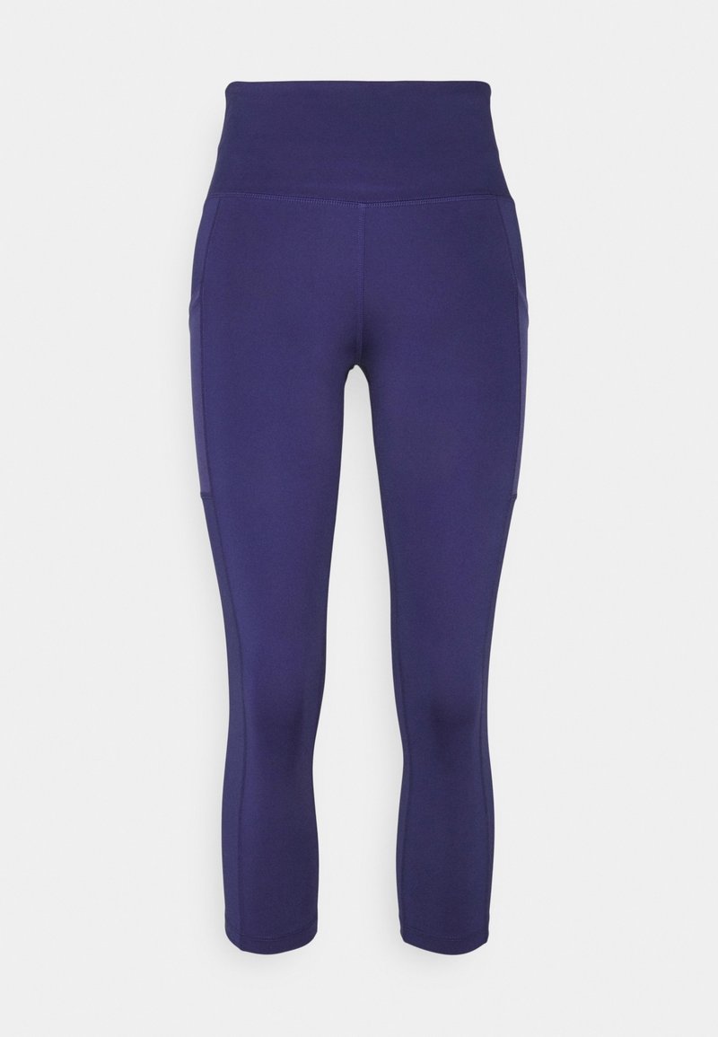 Fioletowe legginsy capri z szerokim pasem, gładką teksturą i bocznymi kieszeniami. Wykonane z elastycznego materiału dla komfortu i swobody ruchów.
