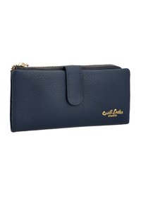 Navy leather wallet with a textured finish, gold hardware accents, a zip closure, and a flap with a snap button. Features brand logo.