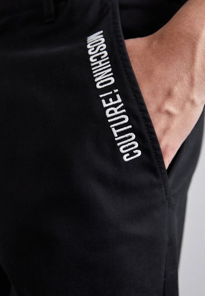 MOSCHINO PANTALONE - Stoffhose - fantasia nero