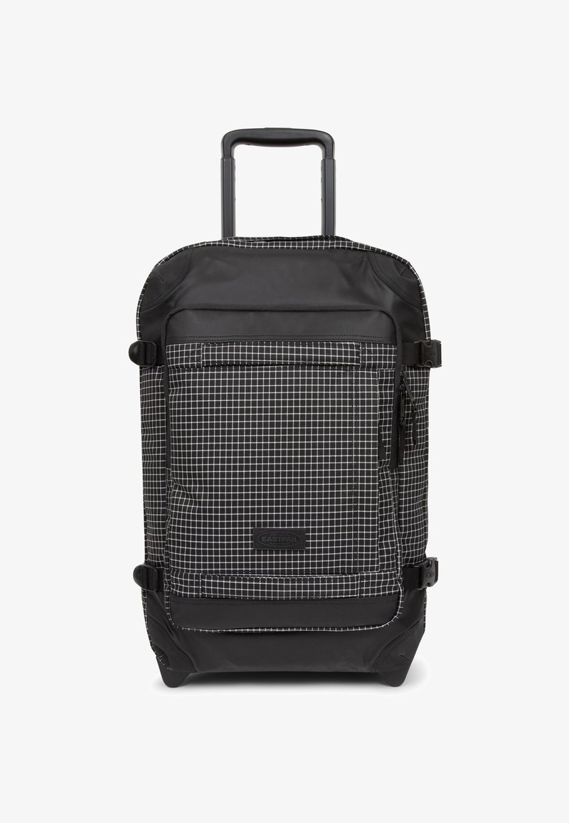 Zaino con ruote nero con motivo a griglia bianca. Realizzato in tessuto resistente, presenta una tasca frontale con zip e una maniglia robusta.