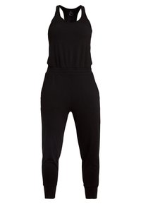Combinaison de sport noire avec un style débardeur, taille élastique et jambes fuselées. Fabriquée en tissu doux avec deux poches latérales.
