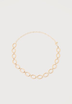 Gouden ketting met afwisselend grote, getextureerde ovale schakels en kleinere schakelkettingen, vastgemaakt met een karabijnsluiting.