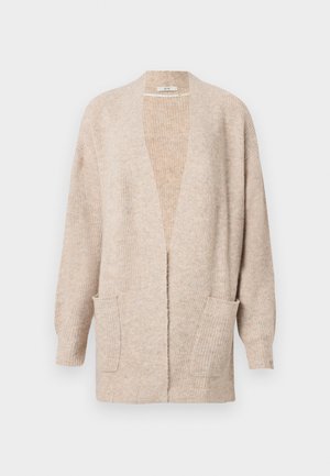 Beige långärmad öppna fram cardigan med två fickor fram och ribbad stickad textur, visad mot en vit bakgrund.