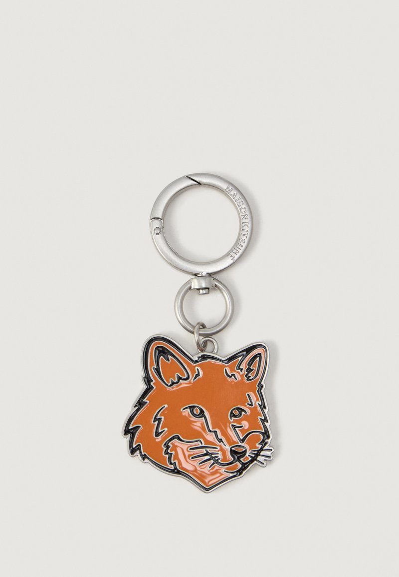 Silver metal keyring with an orange enamel fox head charm outlined in black and silver, attached to a split ring.