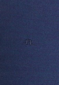 J.LINDEBERG Stickad tröja - blue