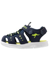 Navy blue children's sandals featuring mesh upper, neon green accents, adjustable strap, and a white cushioned sole. Open design for breathability.