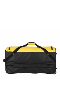 Borsa da viaggio nera e gialla realizzata in materiale resistente, con due spallacci, una maniglia superiore e un vano con zip.