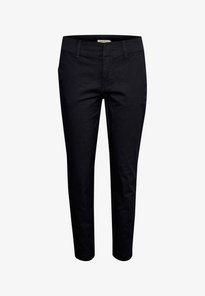 Mustad puuvillased püksid, millel on kitsas lõige, keskelt kõrgem vöökoht, neli taskut ja sile tekstuur. Minimaalsed õmblusaktsendid.