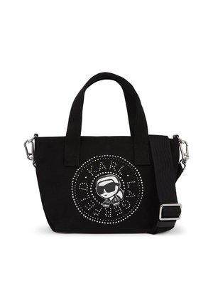 Zwarte draagtas met korte handvatten en afneembare schouderriem, met een gestippeld cirkellogo met een gestileerde persoon die een zonnebril draagt.